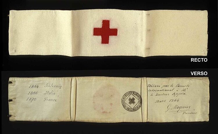 Erste Rotkreuz-Armbinde, wie sie Louis Appia 1864 getragen hat. Der Chirurg gehörte zu den fünf Gründungsmitgliedern des Internationalen Komitees vom Roten Kreuz (IKRK) Erste Rotkreuz-Armbinde, wie sie Louis Appia 1864 getragen hat. Der Chirurg gehörte zu den fünf Gründungsmitgliedern des Internationalen Komitees vom Roten Kreuz (IKRK)